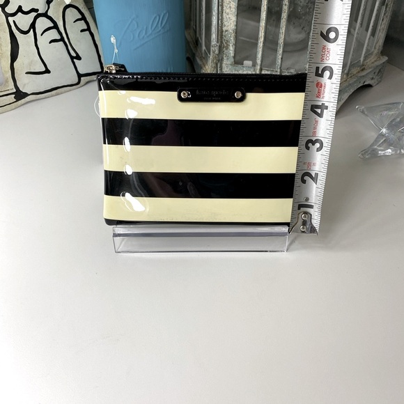 NWT Kate Spade black striped pouch